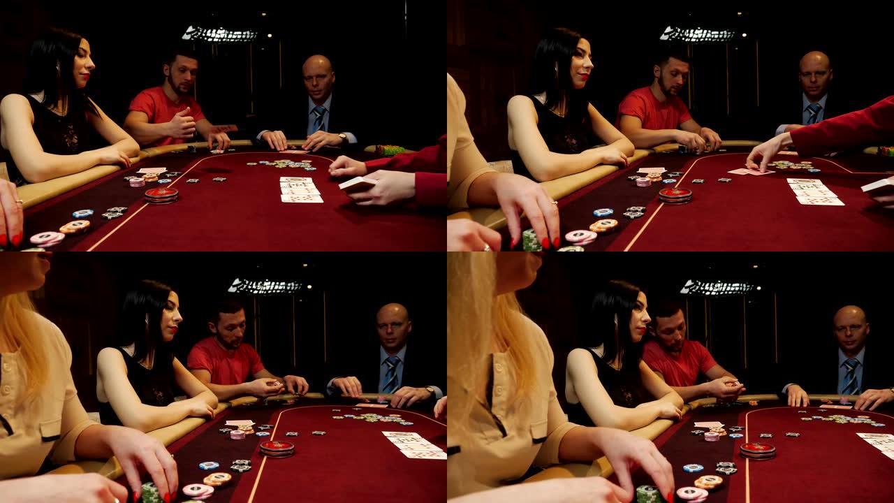 人们在玩扑克。两个男人和两个女人。赌场赌博。