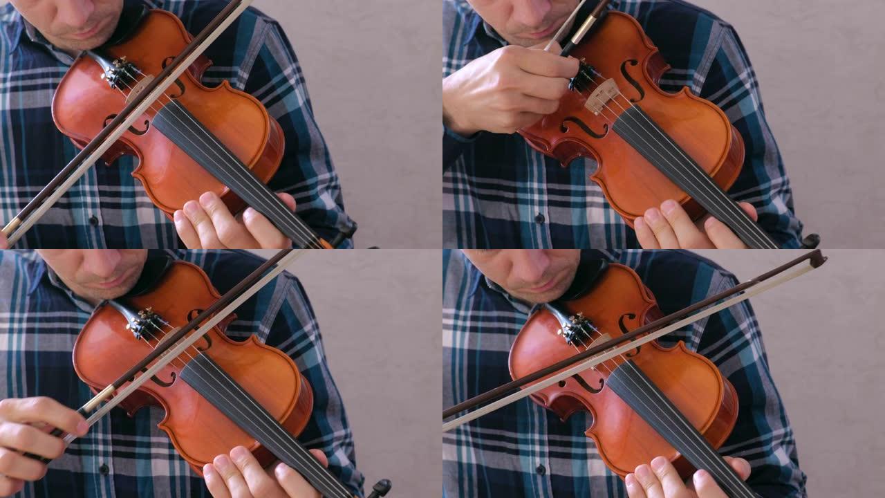 男人调整小提琴扭转螺栓并用弓演奏。
