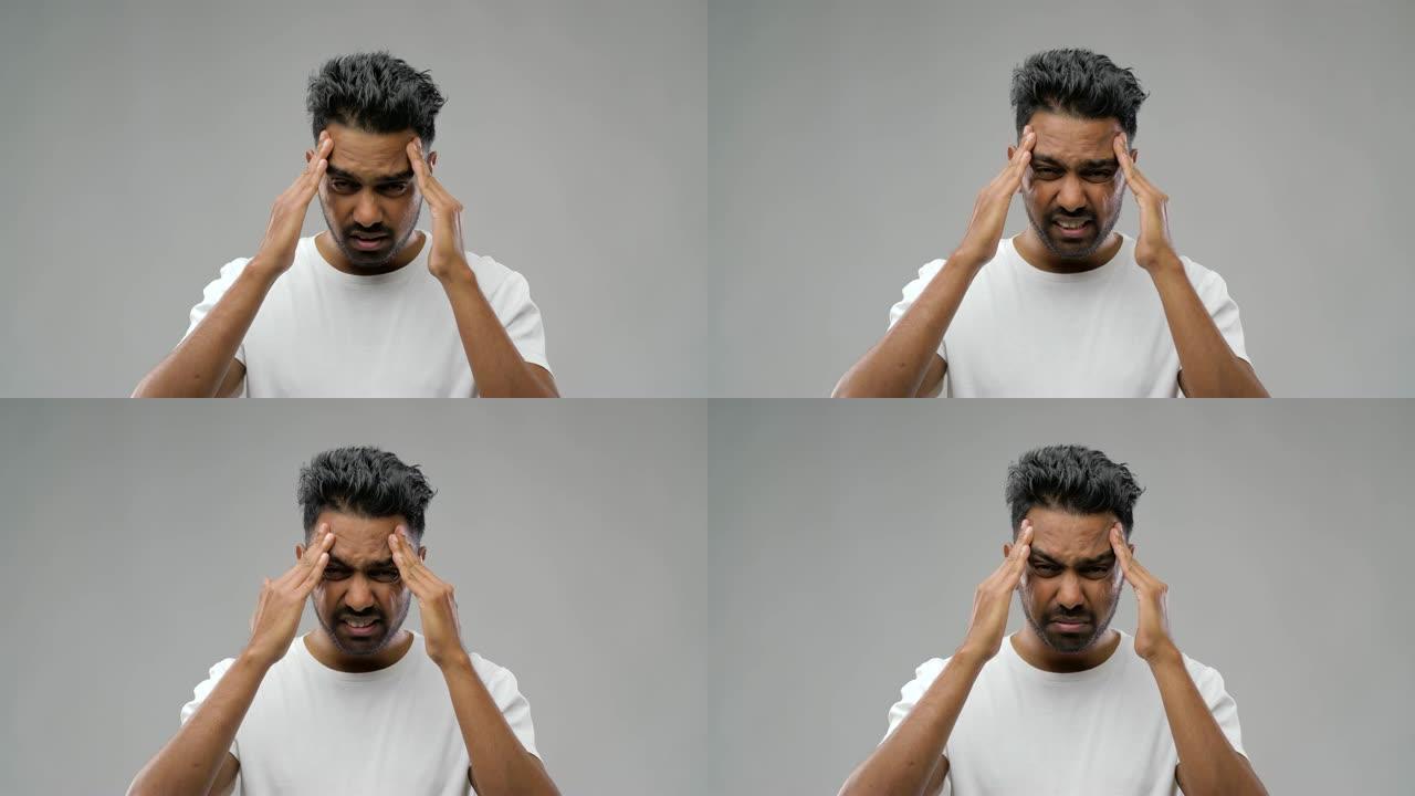 不幸的印度男子患有头痛