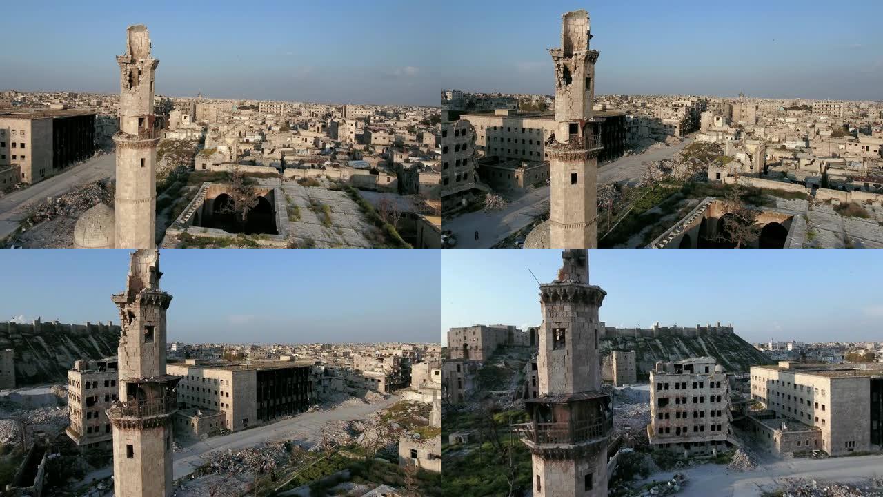 在橙色夕阳下，阿勒颇街头的阿勒颇城堡全景图。叙利亚阿勒颇街头被毁坏的建筑。