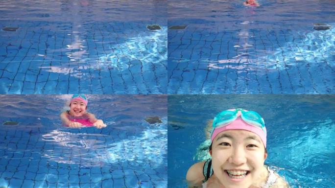 在游泳池里用踢脚板游泳的日本女孩