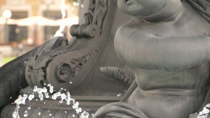 斯图加特喷泉上的小天使脸的特写