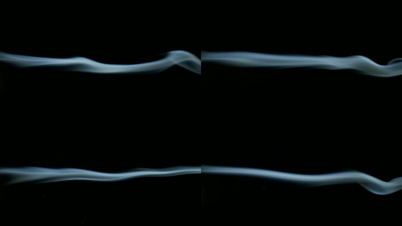 抽象白色蓝色烟波在黑色背景上缓慢移动