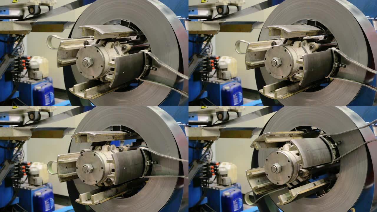 金属制品制造中机器开卷机上的冷轧钢卷。