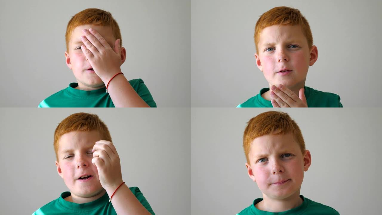 年幼的孩子看着相机，触摸他的脸表示绝望。室内雀斑的严肃红发男孩的肖像。用悲伤的表情关闭男孩子的情绪。