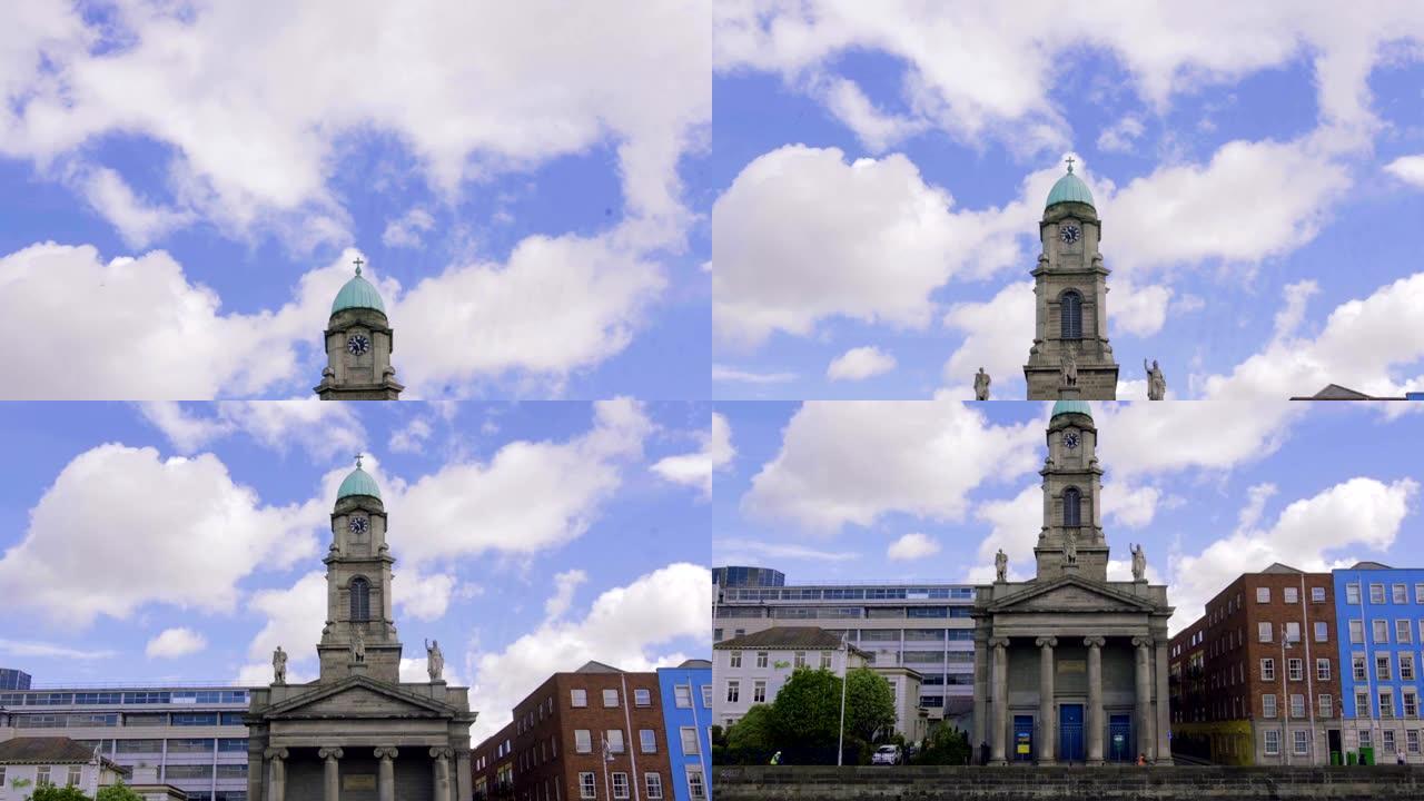 在都柏林的夏日，交通和人员在桥上移动。利菲河和爱尔兰都柏林的四个法院大楼。