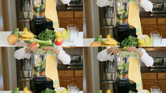 将新鲜水果和蔬菜放入搅拌机