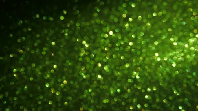 绿色颗粒背景。粒子不同运动的闪光系列。版本8