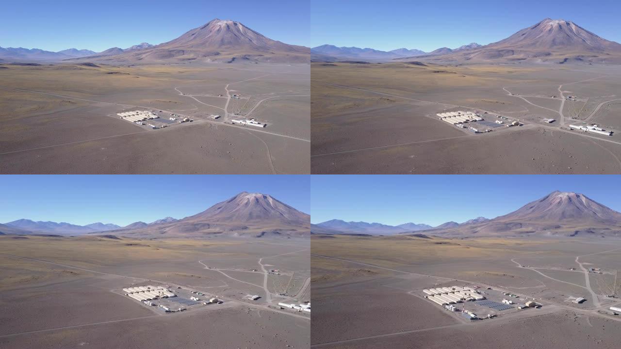 航拍镜头。在圣佩德罗火山田野的安第斯山脉内的智利altiplano的3,500多个masl的地热营地