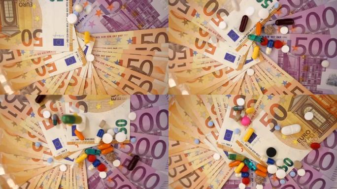 视频，各种药物落在慢动作下方的欧元钞票上