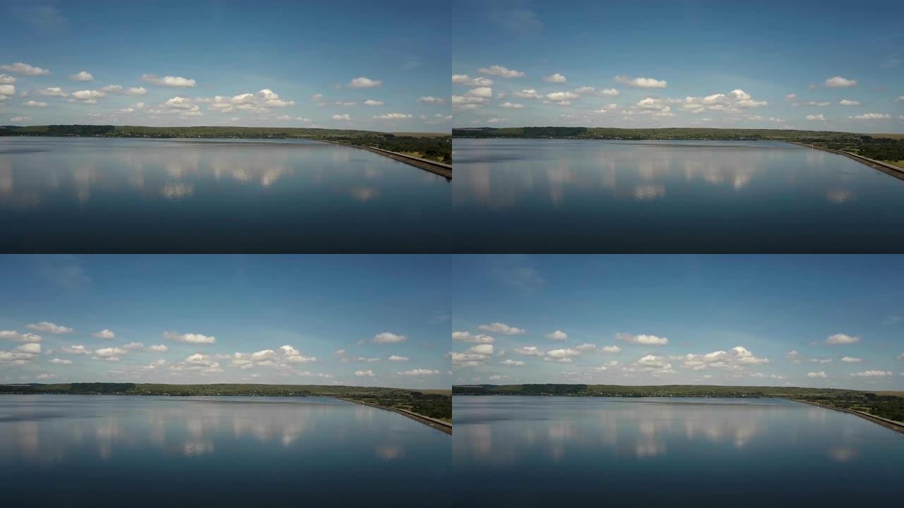 在蓝天白云背景下的湖泊的航空摄影乌克兰Burshtyn市