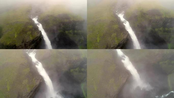 冰岛令人叹为观止的瀑布云层上方的鸟瞰图。