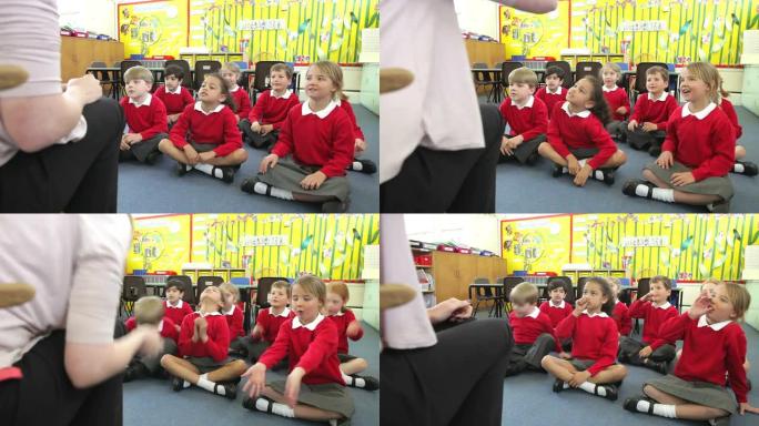 学生在唱歌时模仿老师的动作