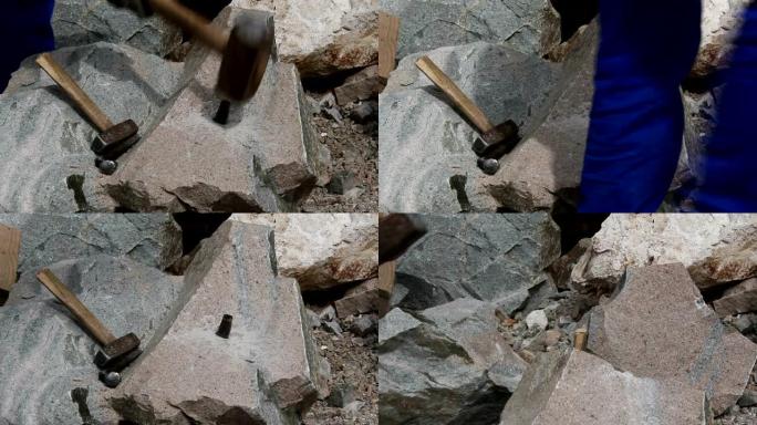 石匠用楔子和大锤切割一块花岗岩