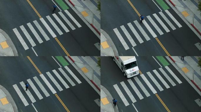 在联邦快递卡车驶过洛杉矶之前，男子越过斑马步道