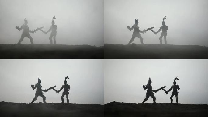 中世纪有骑兵和步兵的战斗场景。人物的剪影作为单独的物体，在日落有雾的背景下战士之间的战斗。选择性聚焦