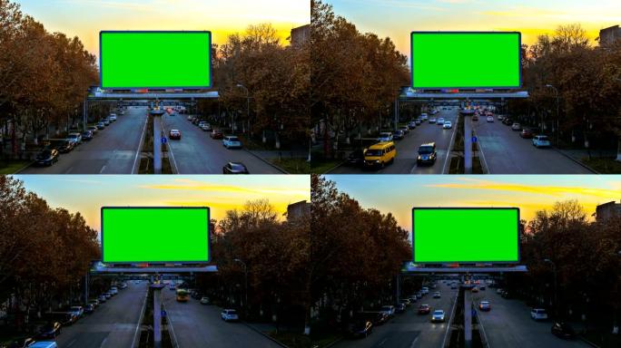 日落时快速行驶的汽车背景上带有绿色色度键的广告牌。摄像机移开了。