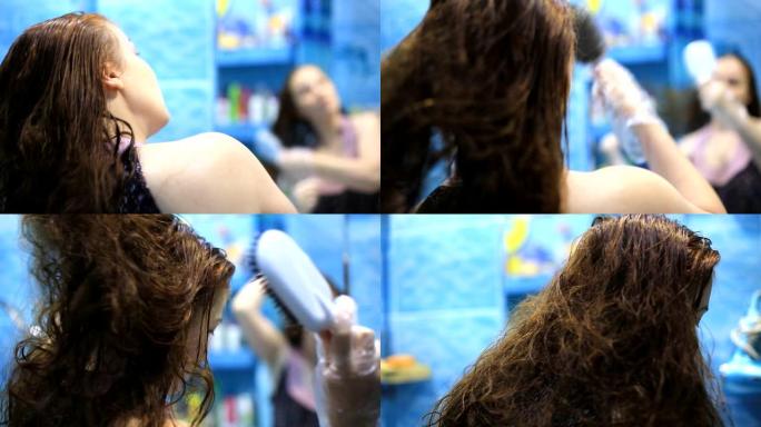 一个年轻漂亮的红发女人在家用指甲花画头发。女性的有机和天然化妆品。