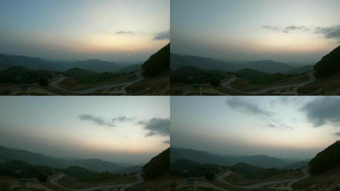 泰国的日落与层山和道路