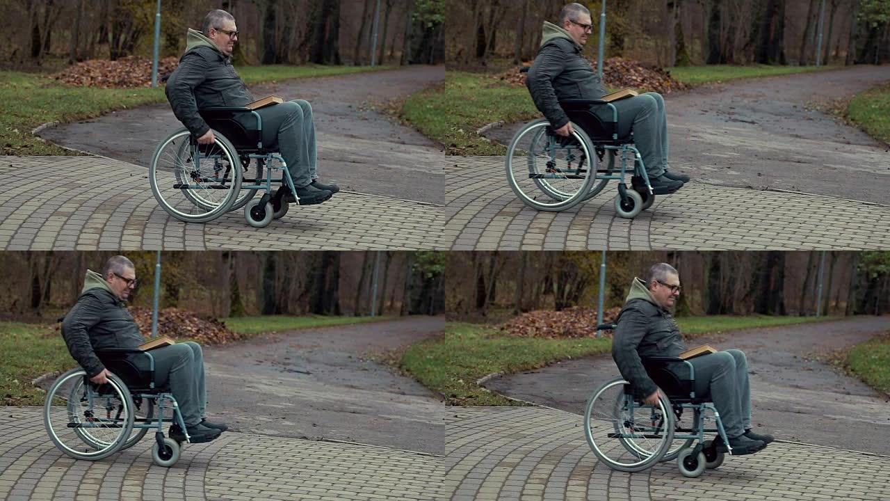 残疾人在公园的户外路径上使用轮椅