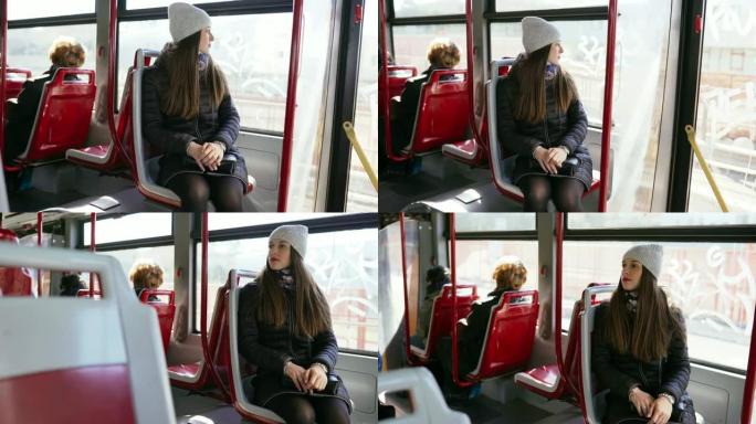 这位年轻女士乘公共交通工具去。公共汽车上的女人。徒步拍摄女孩的动作。4