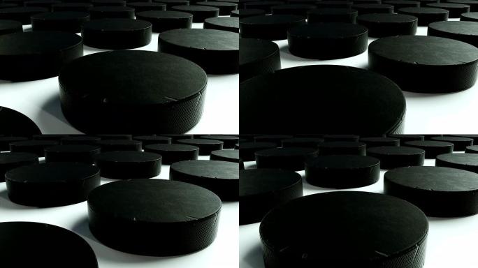 表面有许多排黑色冰球，运动电脑生成背景，3d渲染