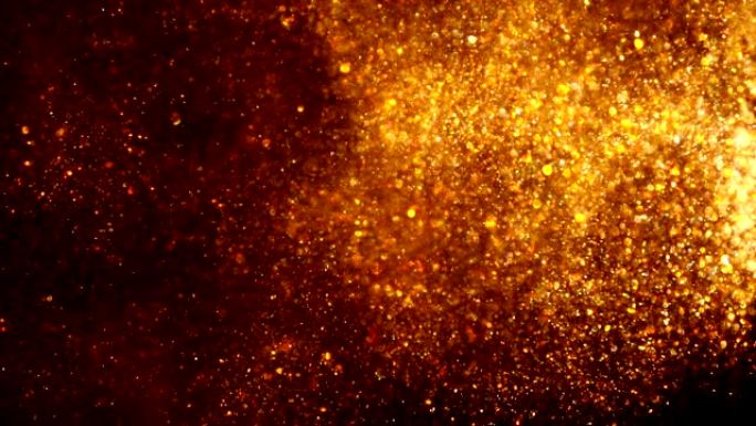 黄金散焦粒子背景。粒子不同运动的闪光系列。版本9