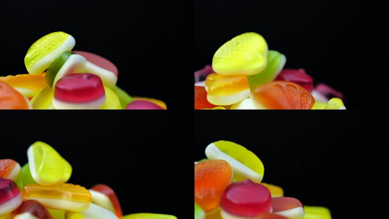 明亮美味的彩色果酱果冻糖果的镜头旋转