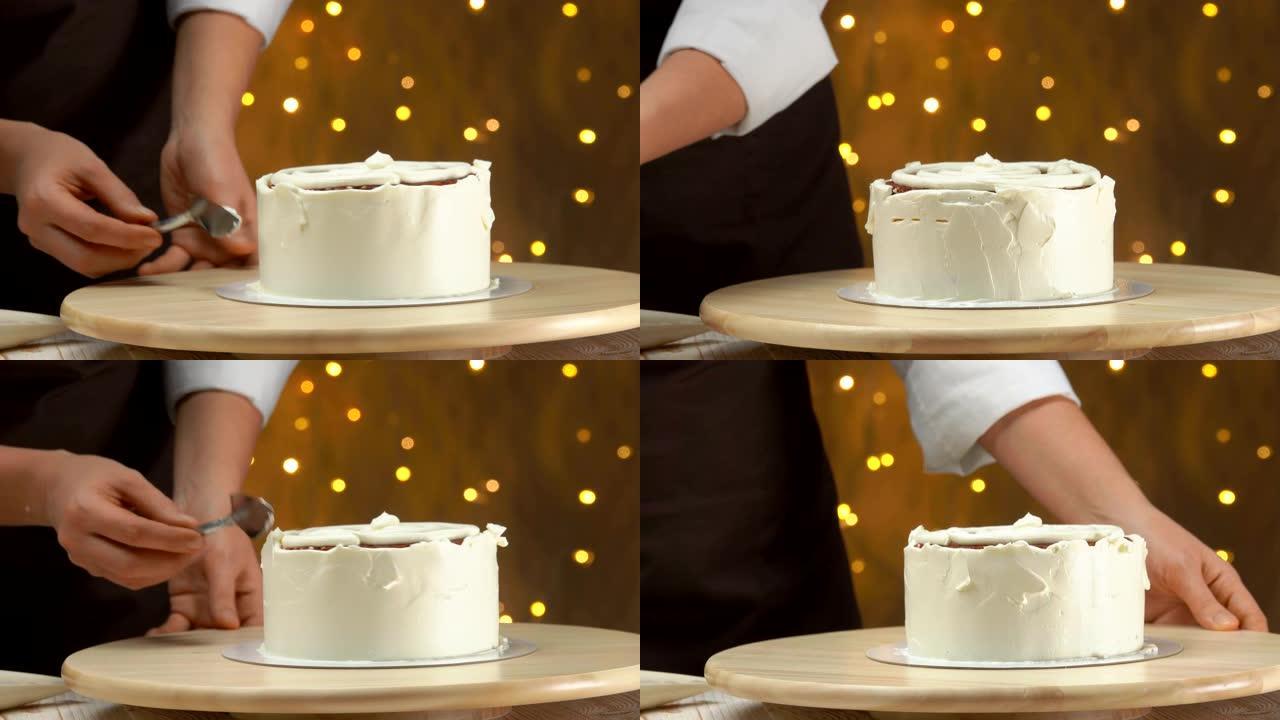 厨师用抹刀把奶油抹平在蛋糕上