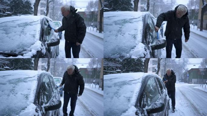 老人从车窗上除雪