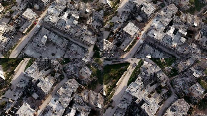 阿勒颇废墟中的房屋鸟瞰图。一座被轰炸摧毁的城市，只剩下残破的房屋，在蓝天下。