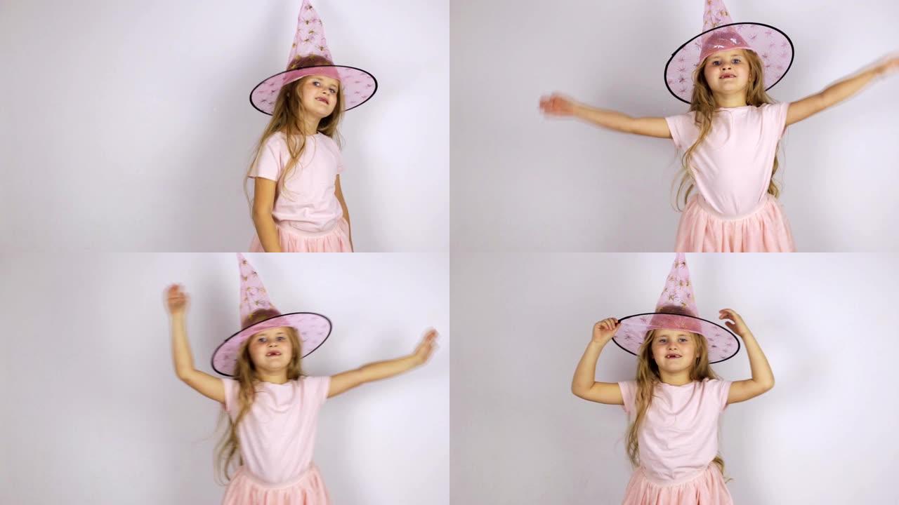 戴着粉红色帽子的女孩跳起来跳舞