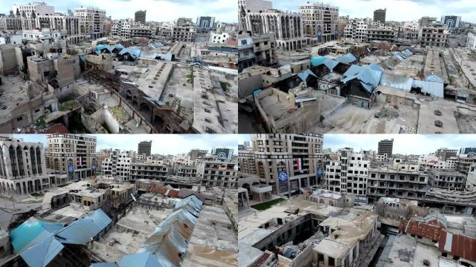 阿勒颇废墟房屋的鸟瞰图。一座被轰炸摧毁的城市，只剩下废墟，在蓝天下。