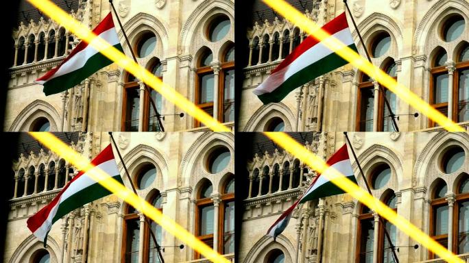 通过窗户上的雨滴观看匈牙利国旗