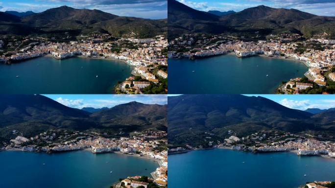 海边美丽的西班牙小镇。蓬塔德萨科斯塔。录像。空中无人机摄像机从海上海滩移开