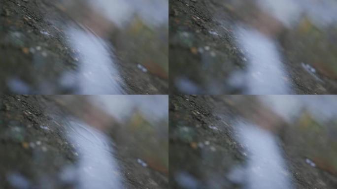 慢动作中的雨天涟漪1920X1080高清镜头-水面上的水滴全高清1080p慢动作视频
