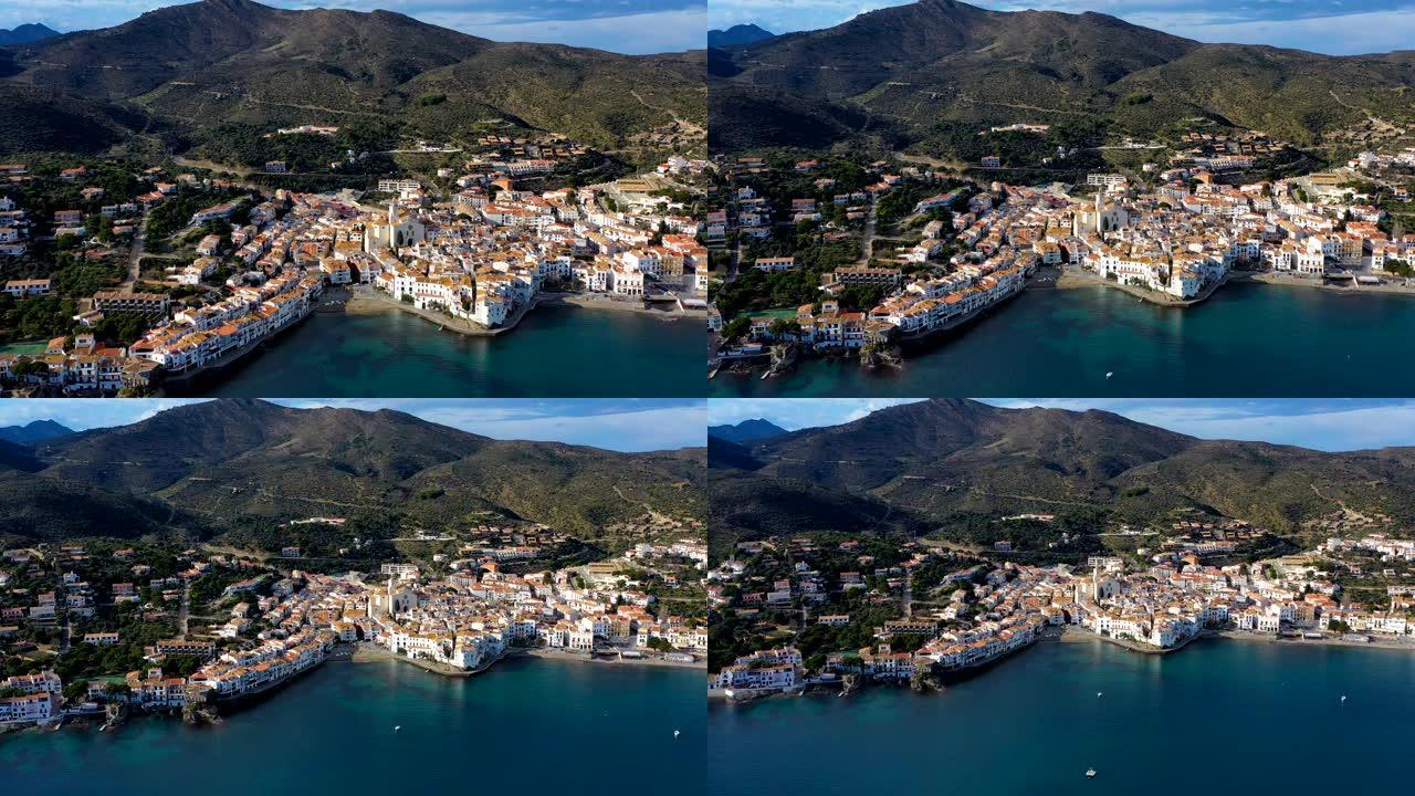 海边神奇的西班牙小镇。蓬塔德萨科斯塔。录像。空中无人机摄像机远离海上海滩。山脉景观和城市景观