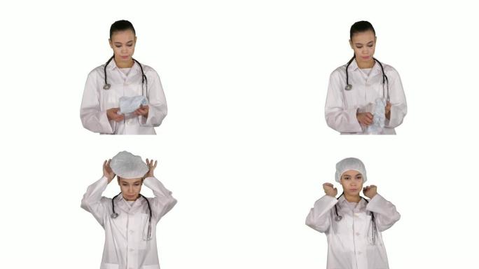 医生用听诊器把医疗帽子或帽子放在白色背景上