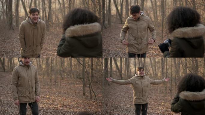 女人在寒假期间拍摄男人在森林里摆姿势