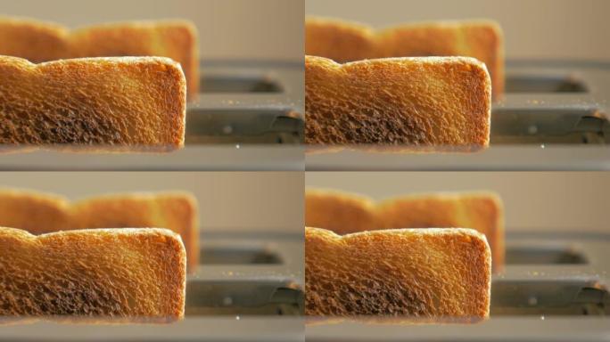 烤面包机中的烤面包，同时出来4K 2160p UHD镜头-烤面包机中的两个烤面包块4K 3840x2