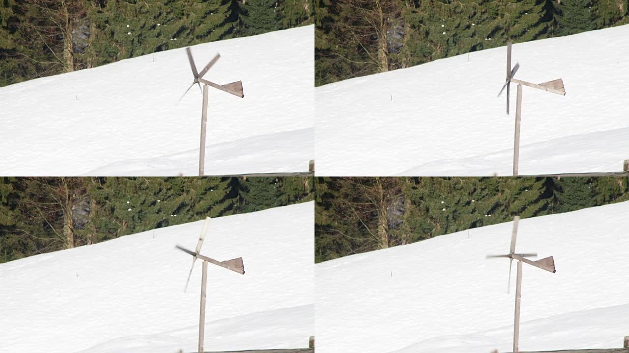 冬天在风中旋转的木制风车
