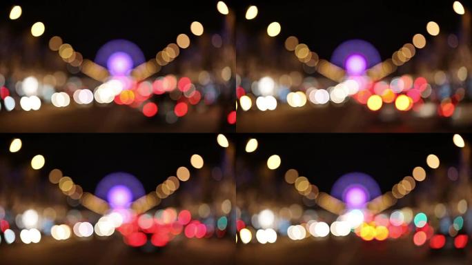 模糊的巴黎香榭丽舍大街，车灯和散景