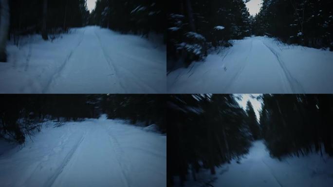 在寒冷的冬夜，一个害怕的人在森林中奔跑或逃跑的手持镜头
