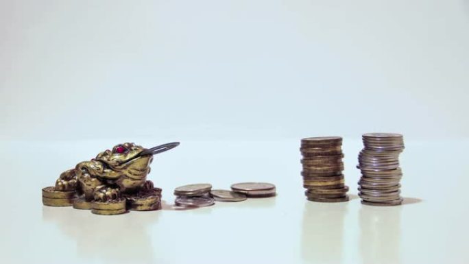 象征财富和繁荣的青蛙，硬币的增长
