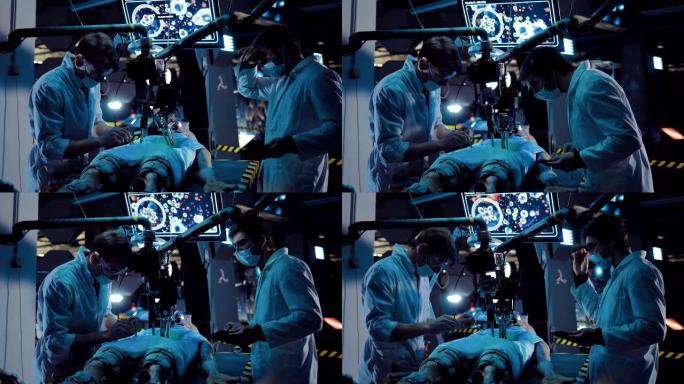 年轻的科学家在手术器械和设备的帮助下进行外星人存在的操作。外星人躺在宇宙飞船的实验室里。