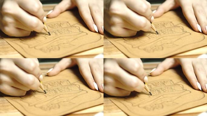 生活方式: 年轻美丽的女孩的手自由艺术家设计师在克拉夫纸上素描和绘制食物插图，在家工作。特写镜头，静