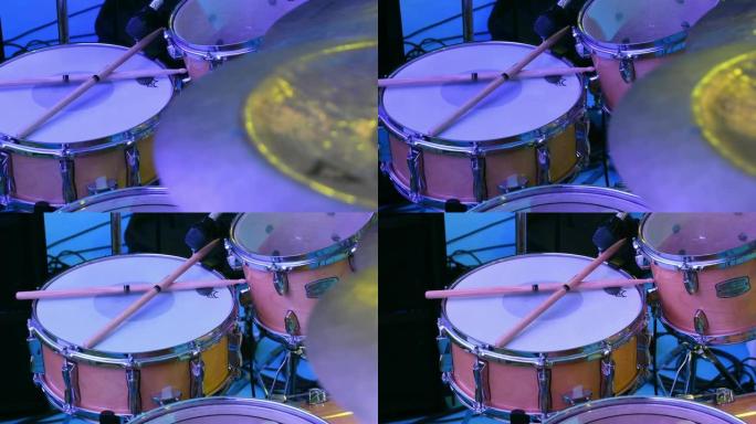 多莉镜头: 乐器，舞台上的架子鼓。