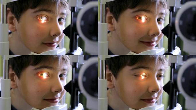 医生检查可爱的孩子的视力，眼科医生办公室裂隙灯的眼睛检查