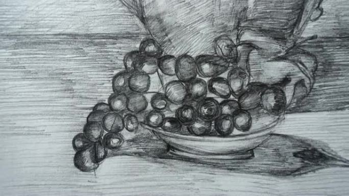 茶壶和葡萄形式的静物。图纸的拍摄。