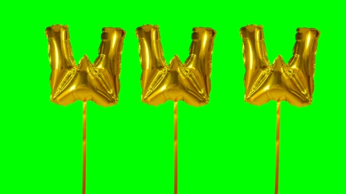 来自绿色屏幕上漂浮的氦气金色气球字母的www网络互联网